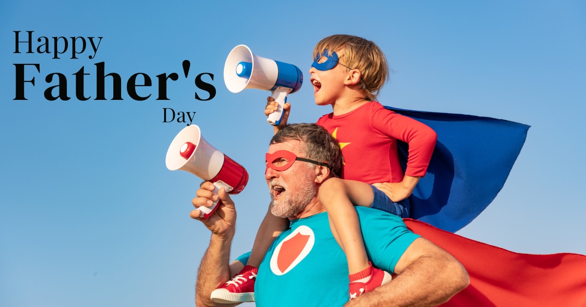 Father and son holding a Father’s Day card, emotional moment celebrating dad