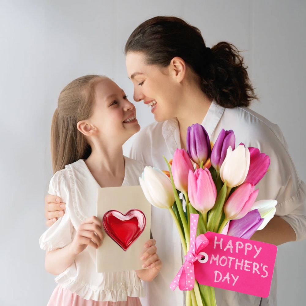 mother and daughter celebrating Mother's Day with tulips and gift card