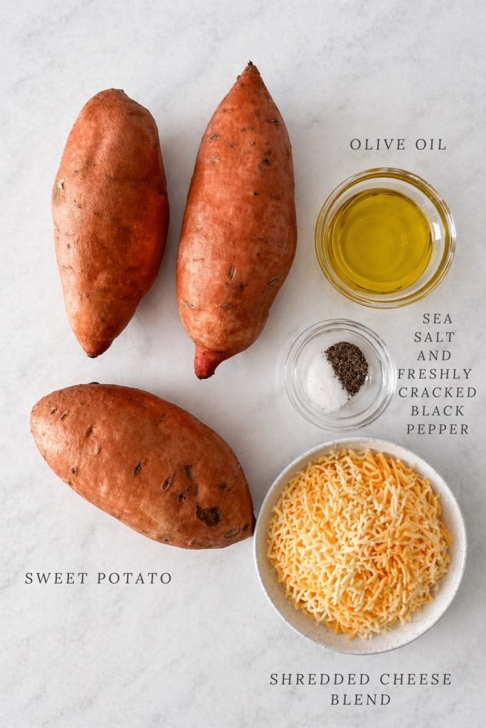 Labeled ingredients for a sweet potato wrap, including sweet potatoes, olive oil, salt, pepper, paprika, and mixed cheese on a clean white background.