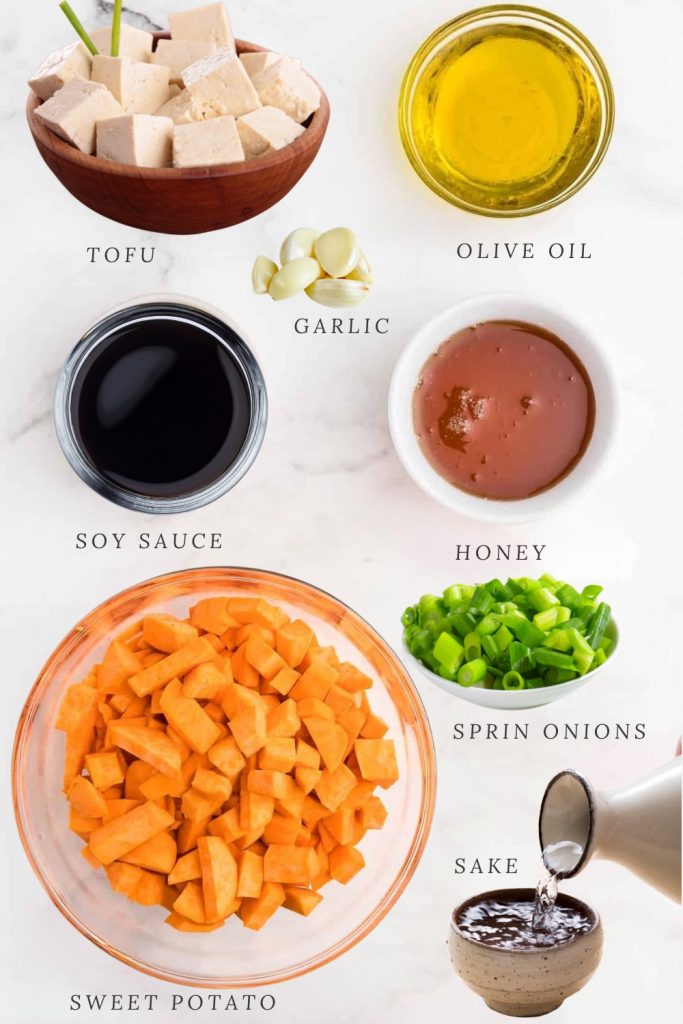 Ingredients for sticky honey garlic sweet potatoes: tofu, olive oil, soy sauce, honey, garlic, sweet potato, spring onions and sake.