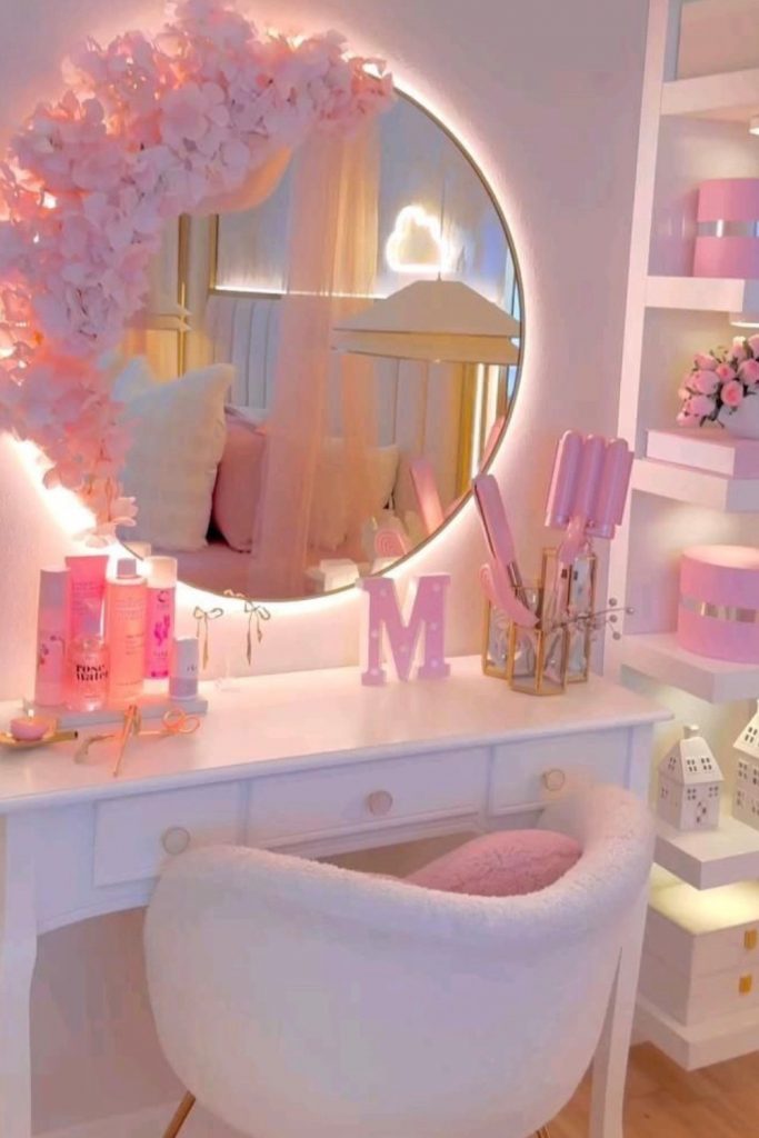 pink vanity setup glam makeup desk round mirror led lights feminine beauty corner aesthetic