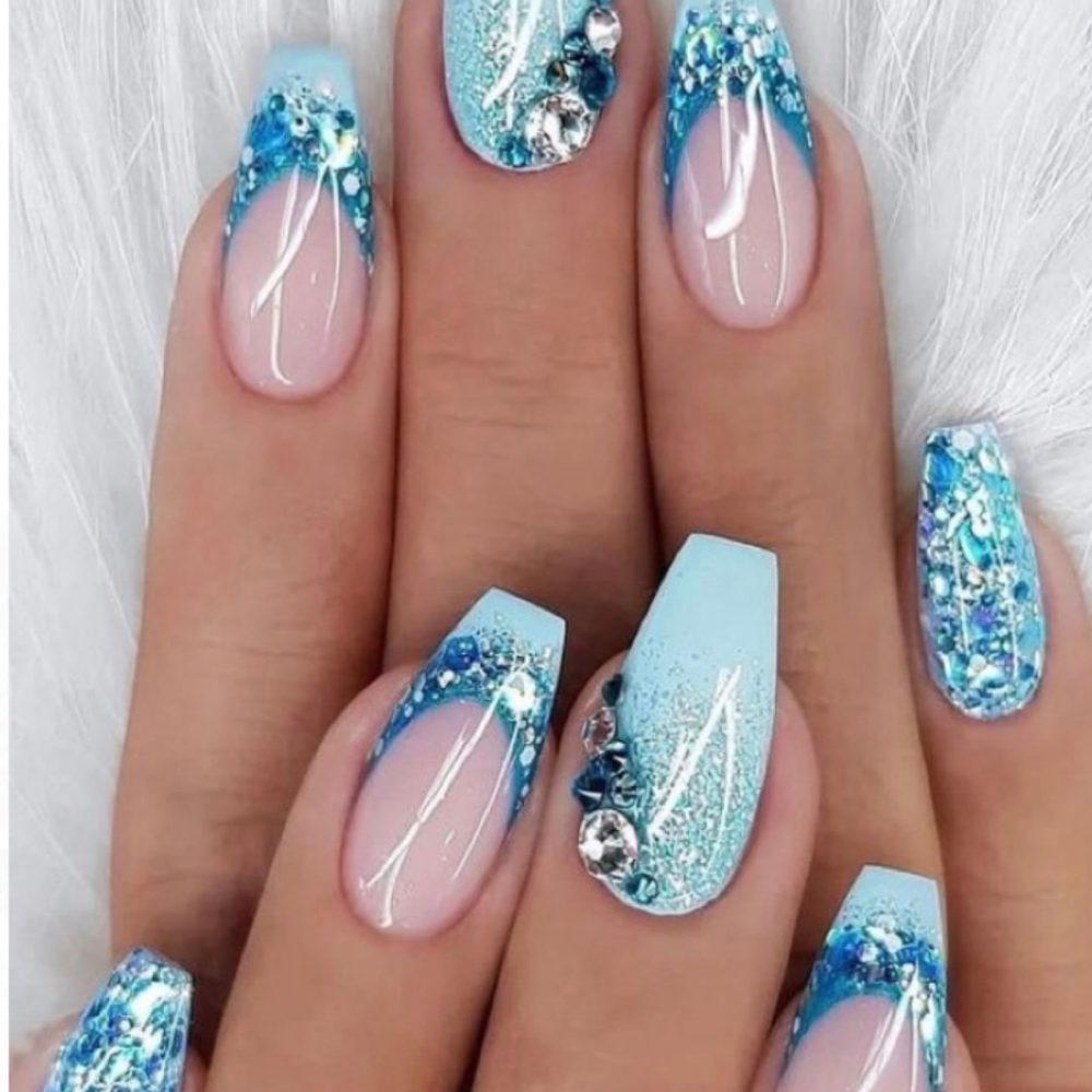 8. Baby Blue Glitter Nails